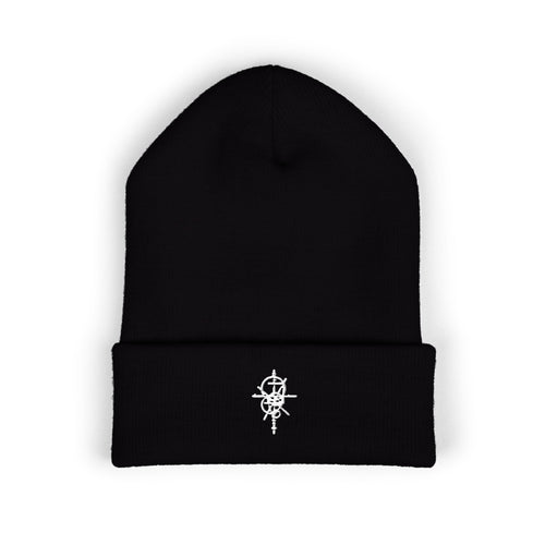 Black Field Beanie, front view with white geometric emblem embroidered on the cuff.
